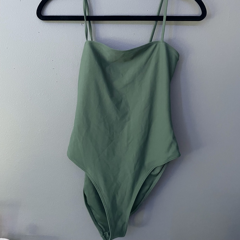 Green one piece bathing suit
